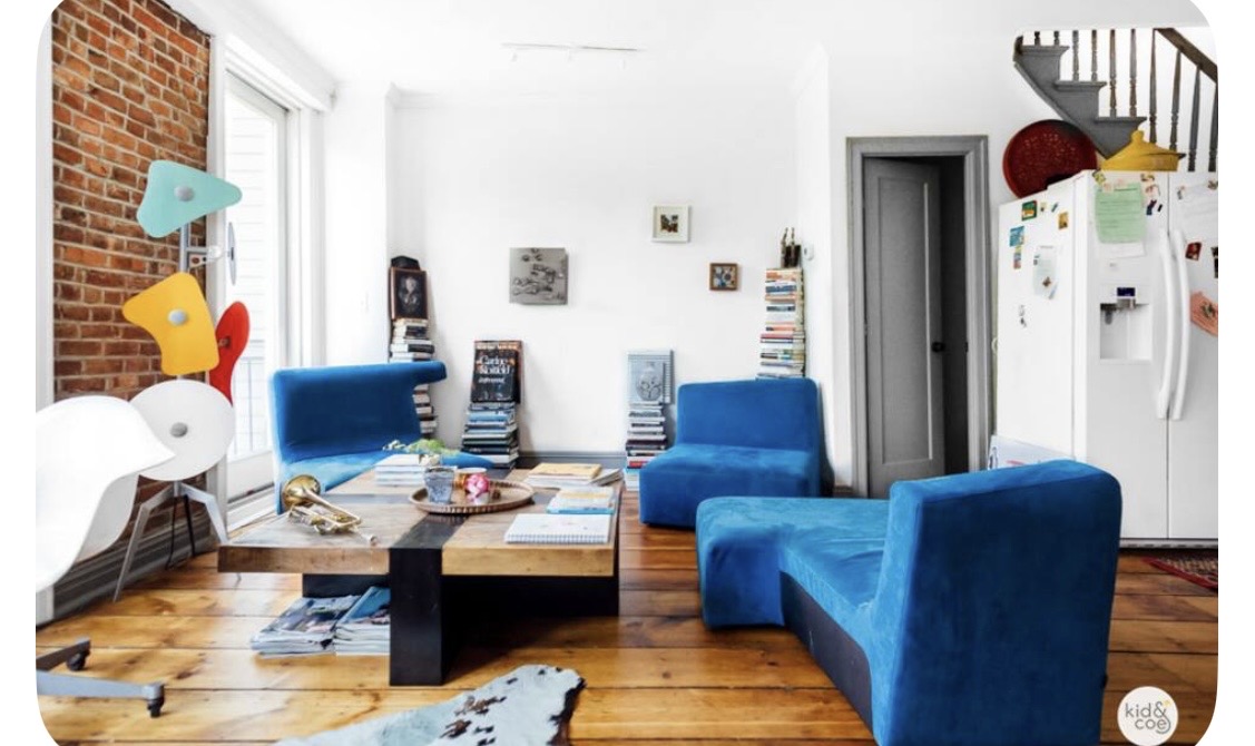 Living room with exposed brick