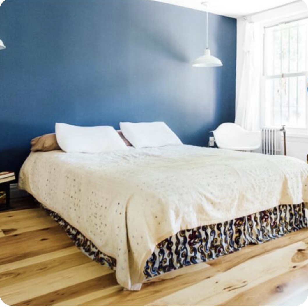 King bedroom with blue wall
